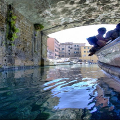 Visit Livorno by boat along the canals