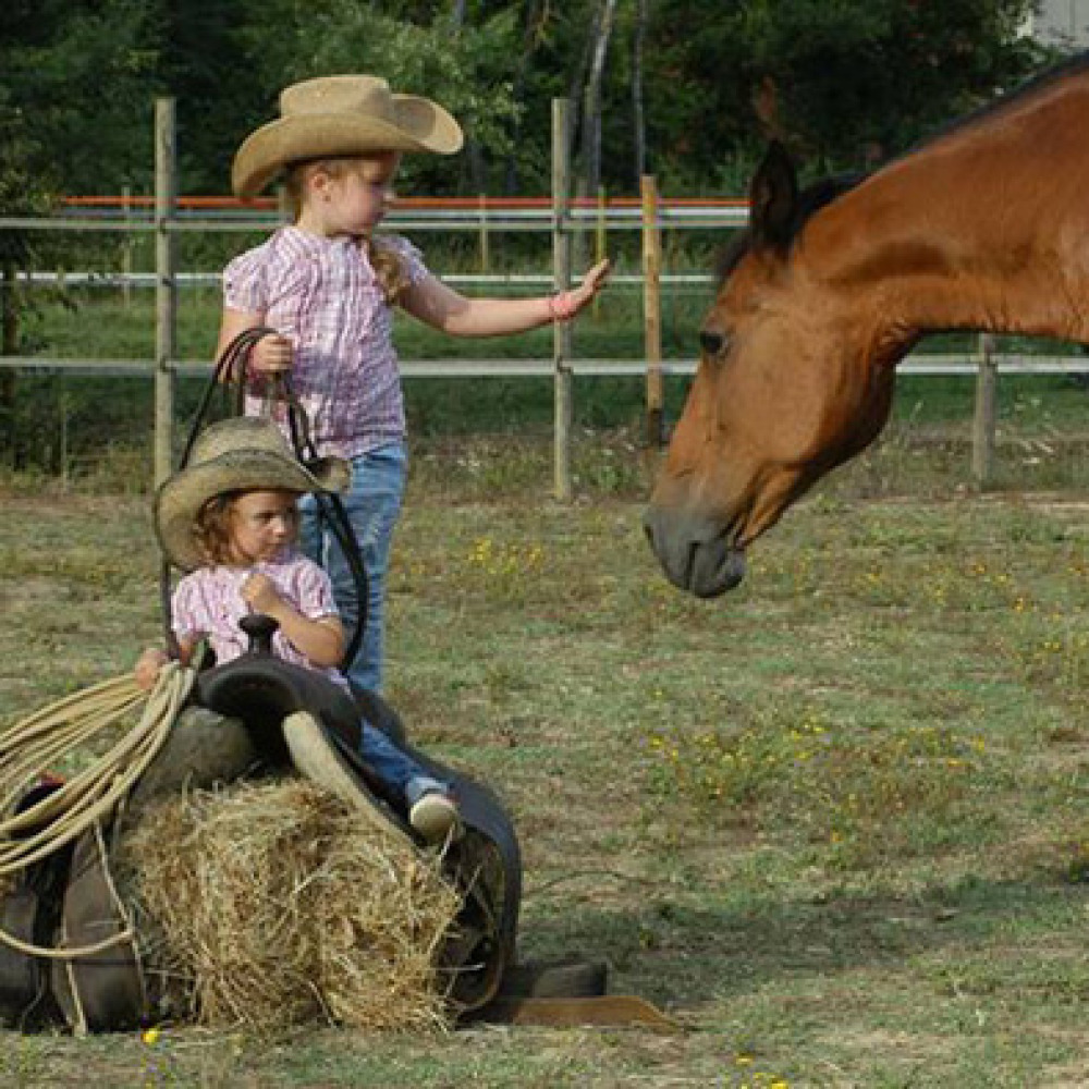 With horse in the nature around Castiglione